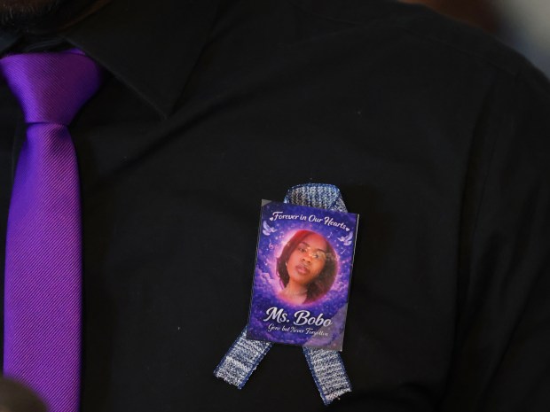 Keith Norman wears a ribbon in honor of Latetia Bobo on Tuesday, March 24, 2026, in Richmond, Calif. Latetia Bobo was killed in a shooting on March 7 in downtown Oakland. (Aric Crabb/Bay Area News Group)