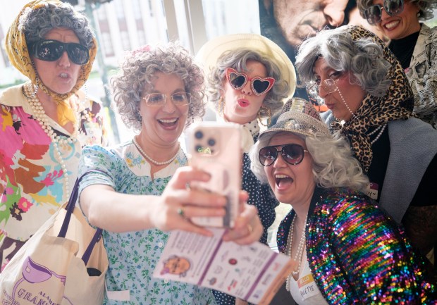 A group of grannies pose for a "selfie" photo inside the Alameda Cinema Grill on Central Ave. during the 2nd Annual GrannyCon in Alameda, Calif., Saturday, March 07, 2026. The lighthearted event is a fundraiser for breast cancer research, education and legislation. GrannyCon was formed by a group of moms during the Coronavirus Pandemic of 2020. (Douglas Despres / for the Bay Area News Group)