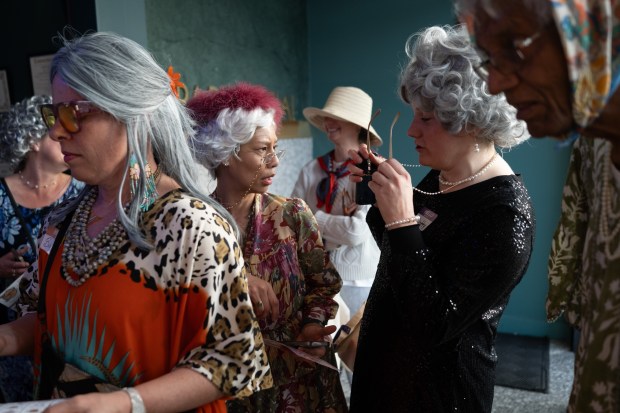 A group of grannies in the entry of Park Social during the GrannyCon 2026 event in Alameda, Calif., Saturday, March 07, 2026. The lighthearted event is a fundraiser for breast cancer research, education and legislation. GrannyCon was formed by a group of moms during the Coronavirus Pandemic of 2020. (Douglas Despres / for the Bay Area News Group)