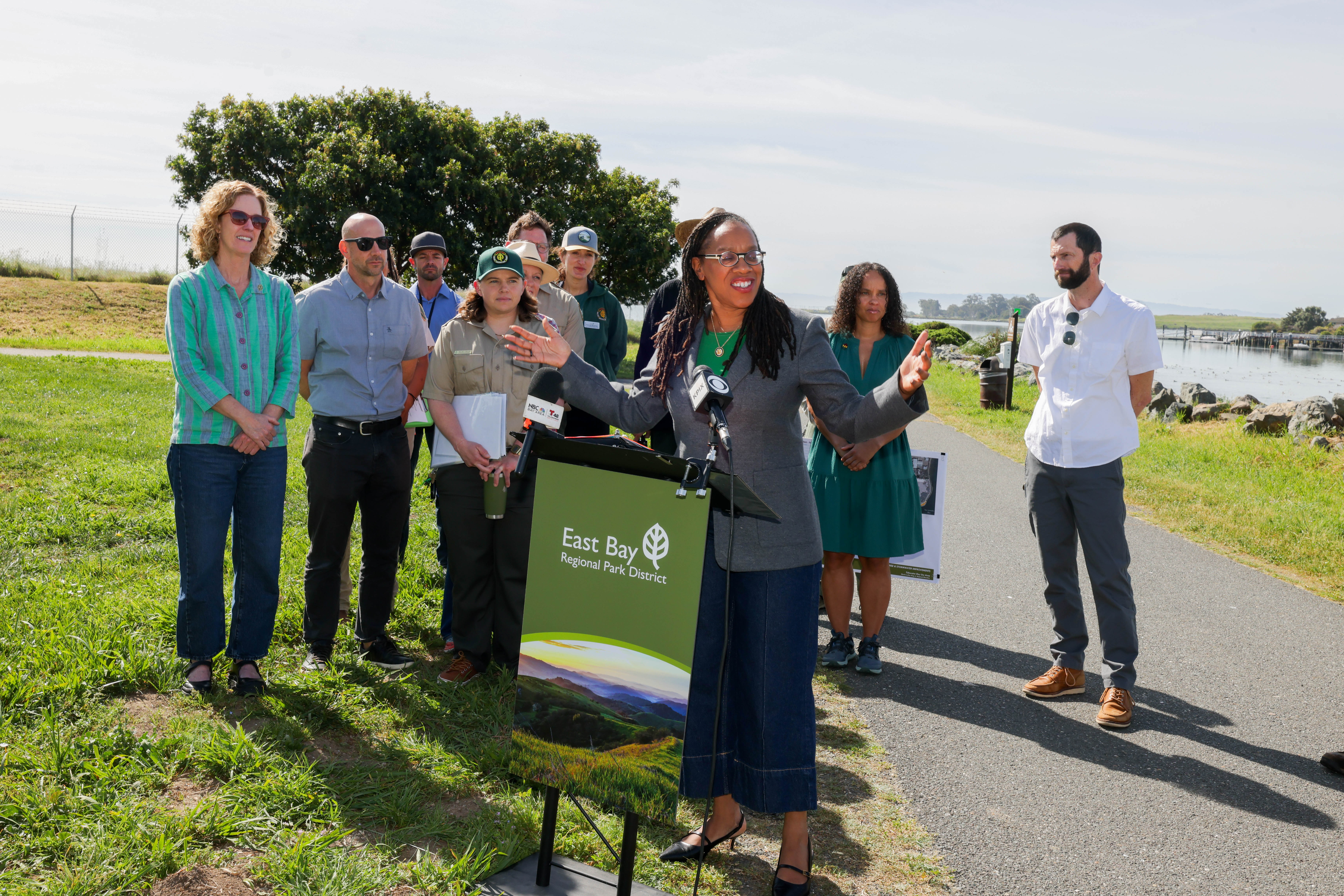 Congresswoman Lateefah Simon speaks before delivering a federal check for...