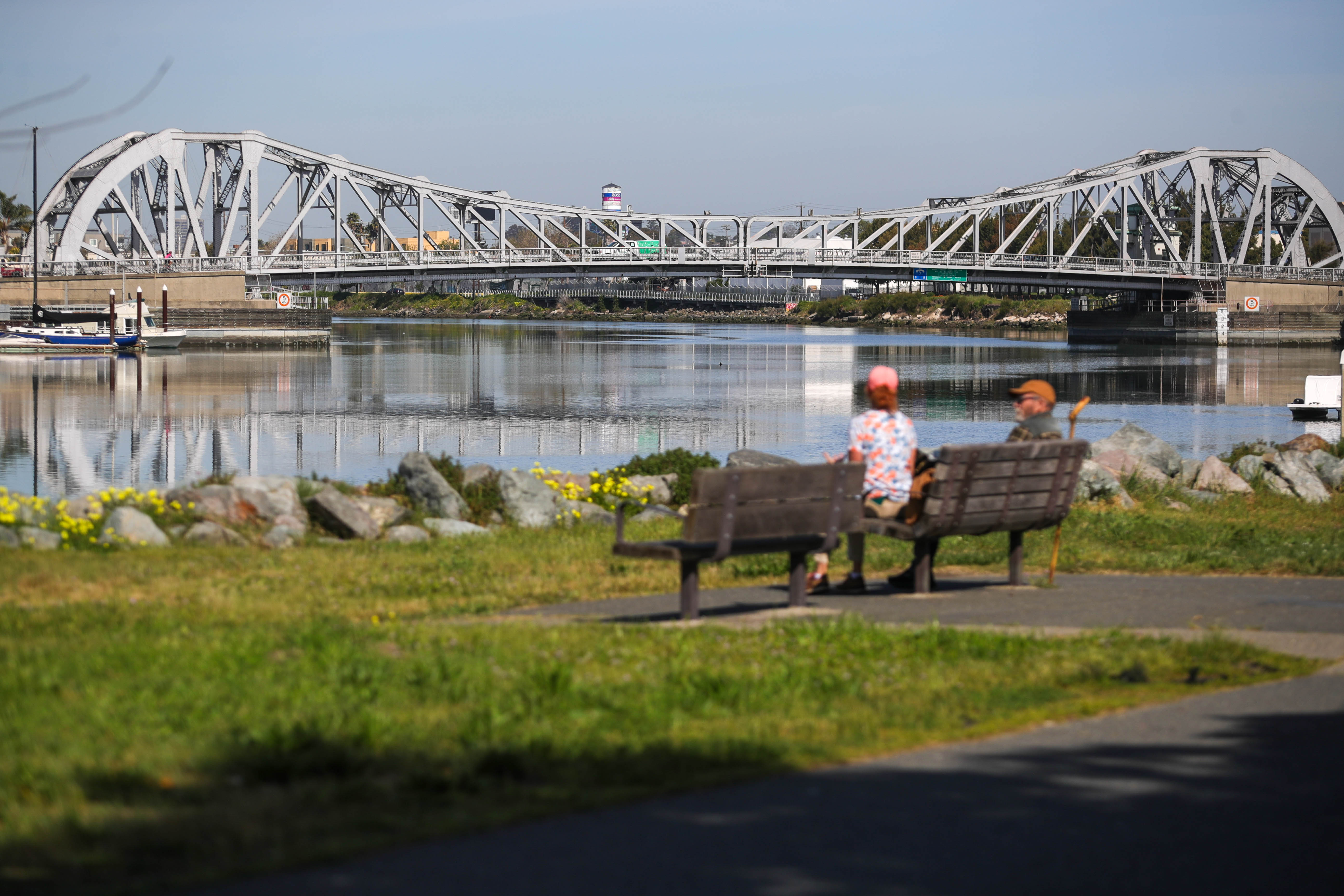 View of the High Street bridge as people relax at...