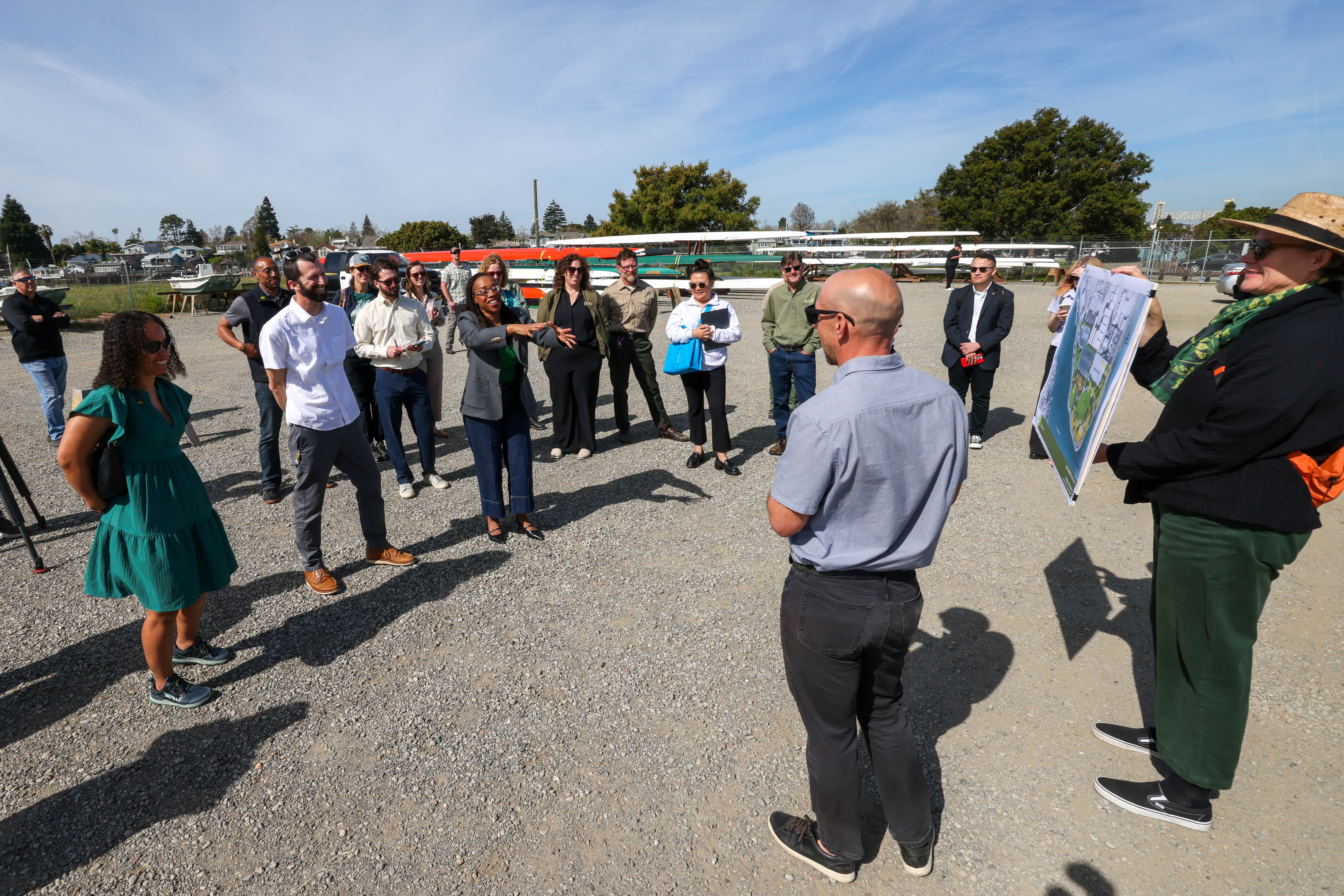 Congresswoman Lateefah Simon, center, tours the planned Tidewater renovation along...
