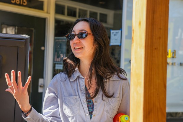 Zoe Quon shares her point of view on the City of Oakland's proposal to build new housing units near the Rockridge BART station in Oakland, Calif., on Friday, March 6, 2026. A new California housing law allows homes to be built near public transit hubs. (Ray Chavez/Bay Area News Group)