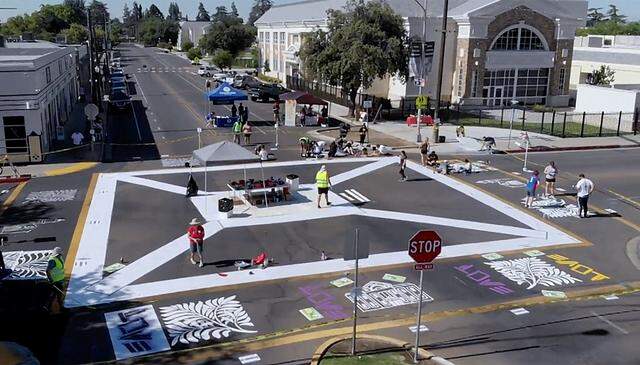 Volunteers and neighbors gathered to create art in front of Fresno High School back in July 2019.