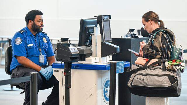 A traveler checks in at the TSA security station at Fresno Yosemite International Airport on Tuesday afternoon, March 10, 2026.