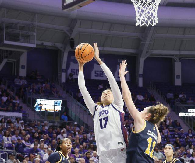 TCU center Clara Silva (17) gets two defended by UC San Diego center Erin Condron (11) during the first half of an NCAA Division I Women's Basketball Championship game at Schollmeier Arena in Fort Worth, Texas, Friday, March, 20, 2026.