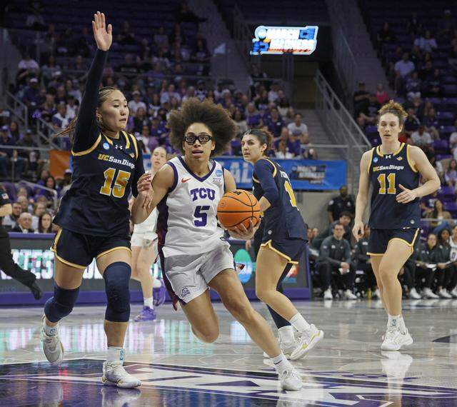 TCU guard Olivia Miles (5) gets a step on UC San Diego guard Sabrina Ma (15) into the key during the first half of an NCAA Division I Women's Basketball Championship game at Schollmeier Arena in Fort Worth, Texas, Friday, March, 20, 2026.