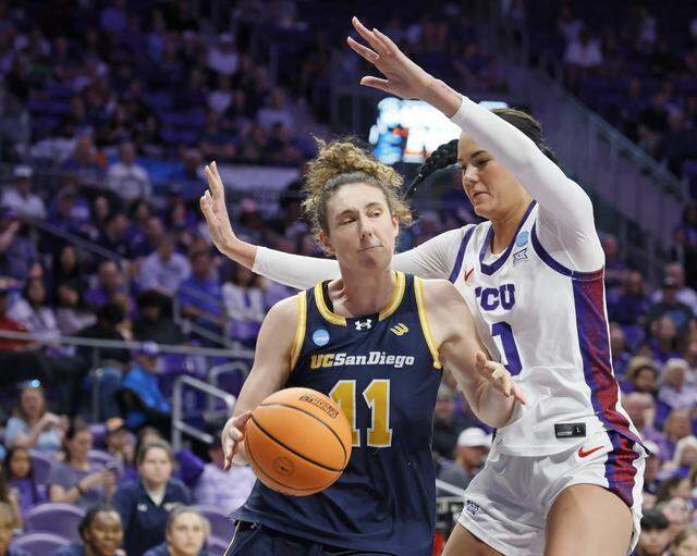 TCU center Kennedy Basham (0) keeps UC San Diego center Erin Condron (11) away from the net during the second half of an NCAA Division I Women's Basketball Championship game at Schollmeier Arena in Fort Worth, Texas, Friday, March, 20, 2026.