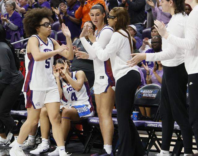 TCU guard Olivia Miles (5) is welcomed back to the bench against UC San Diego during the second half of an NCAA Division I Women's Basketball Championship game at Schollmeier Arena in Fort Worth, Texas, Friday, March, 20, 2026.
