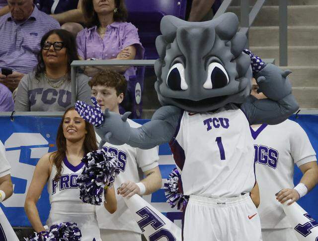 Super Frog performs with the Showgirls during the first half of an NCAA Division I Women's Basketball Championship game at Schollmeier Arena in Fort Worth, Texas, Friday, March, 20, 2026.