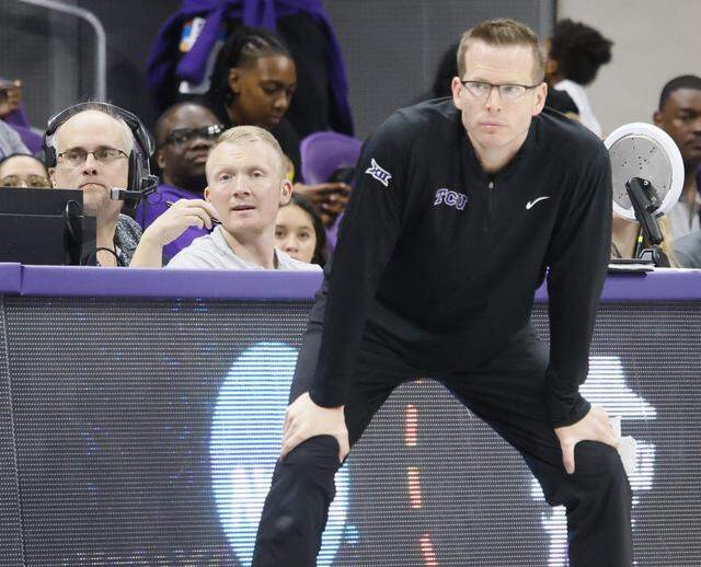 TCU head coach Mark Campbell watches his teams offense against UC San Diego during the first half of an NCAA Division I Women's Basketball Championship game at Schollmeier Arena in Fort Worth, Texas, Friday, March, 20, 2026.