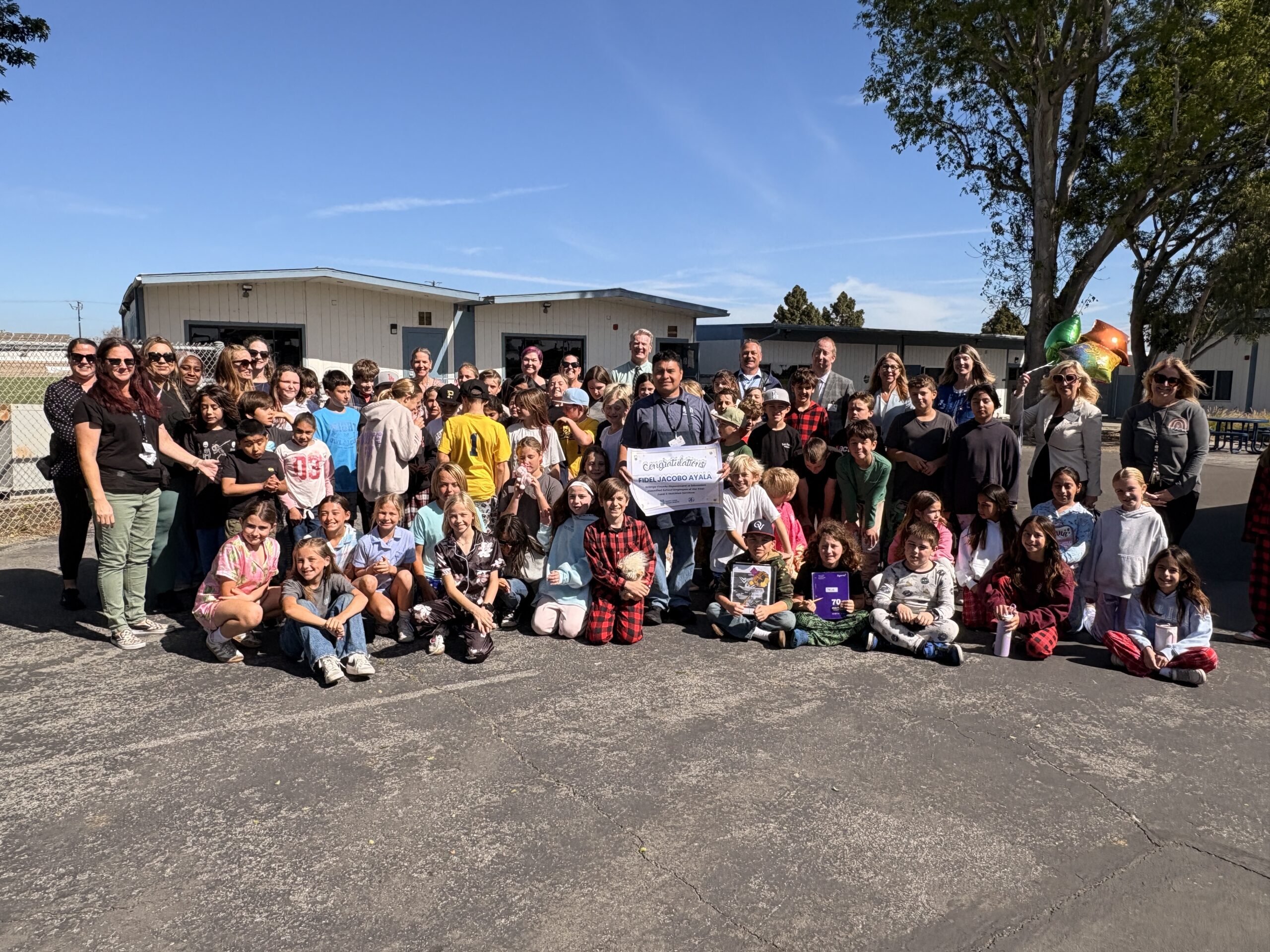 Fidel Jacobo Ayala, lead food service worker at Hope View Elementary School in the Ocean View School District, celebrates with school staff after being recognized as his district’s Classified School Employee of the Year. He later earned county recognition in Food and Nutrition Services.