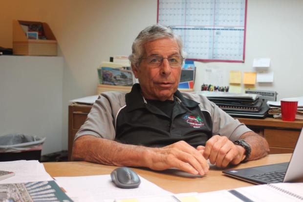 Columnist Harry Saltzgaver took this photo of Grand Prix Association of Long Beach President and CEO Jim Michaelian at the GPALB headquarters in September 2018 -- when Saltzgaver was the executive editor of the Grunion Gazette -- for a story about about sponsorships. (File photo by Harry Saltzgaver, Grunion Gazette/SCNG)