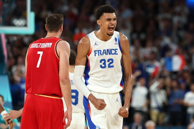 Victor Wembanyama of Team France reacts after a play during the men's basketball semifinal between Team France and Team Germany on at the Paris Summer Olympics at Bercy Arena on August 08, 2024 in Paris, France. (Photo by Gregory Shamus/Getty Images)