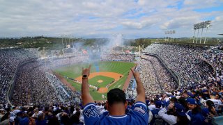 Fans arrive for the Dodgers Opening Day game with the Detroit Tigers