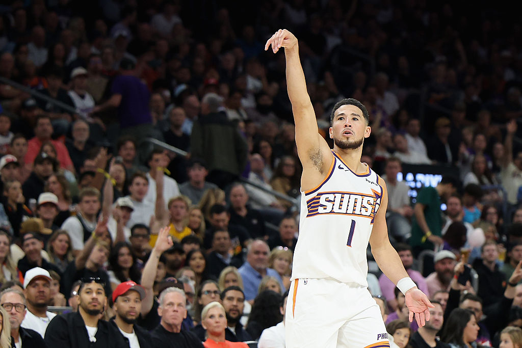 PHOENIX, ARIZONA - NOVEMBER 06: Devin Booker #1 of the Phoenix Suns attempts a three-point shot against the LA Clippers during the first half of the NBA game at Mortgage Matchup Center on November 06, 2025 in Phoenix, Arizona. NOTE TO USER: User expressly acknowledges and agrees that, by downloading and or using this photograph, user is consenting to the terms and conditions of the Getty Images License Agreement. (Photo by Christian Petersen/Getty Images)