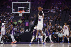 SACRAMENTO, CALIFORNIA - MARCH 19: Justin Edwards #11 of the Philadelphia 76ers shoots a three-point shot in the first quarter against the Sacramento Kings at Golden 1 Center on March 19, 2026 in Sacramento, California. NOTE TO USER: User expressly acknowledges and agrees that, by downloading and or using this photograph, User is consenting to the terms and conditions of the Getty Images License Agreement. (Photo by Lachlan Cunningham/Getty Images)