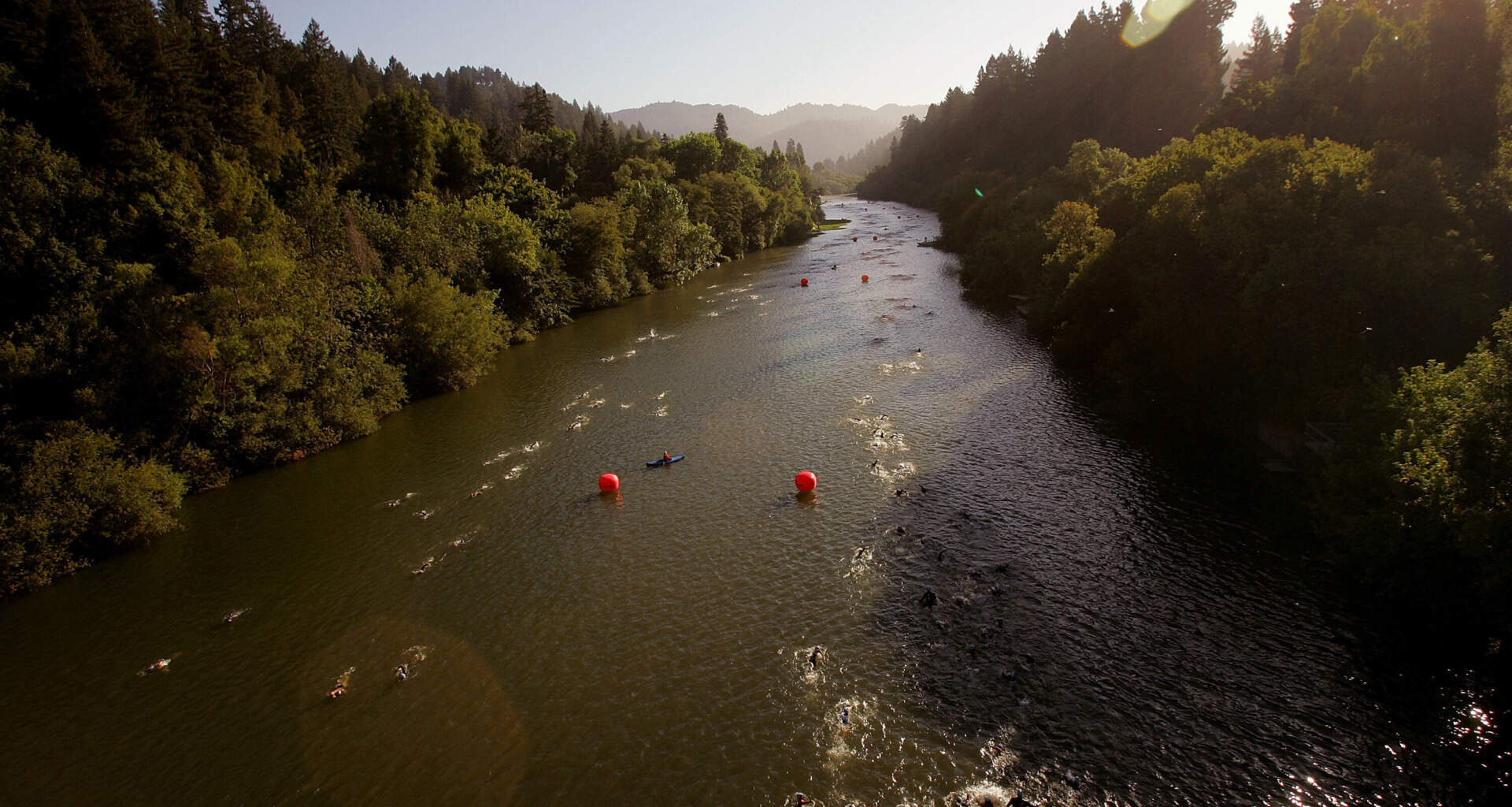 Athletes swim in the Russian River during  the an ironman in Santa Rosa, California. (Ezra Shaw/Getty Images)