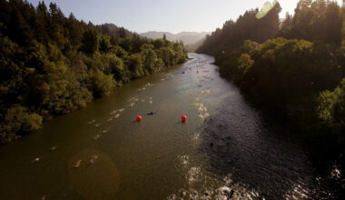 Athletes swim in the Russian River during  the an ironman in Santa Rosa, California. (Ezra Shaw/Getty Images)