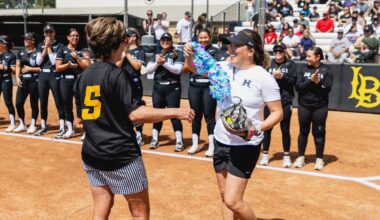 Hawaii softball coach Panita Thanatharn presented her mentor, recently retired Long Beach State coach Kim Sowder, a lei during a first pitch ceremony at the LBSU Softball Complex on Saturday.