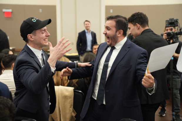 Matthew Helou and Wesam Almasri celebrate after learning where they matched. Over 40% matched in Michigan.Photo courtesy OU