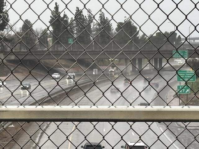 Rain can be seen on Highway 41 in Fresno, California on Monday, Feb. 16, 2026.