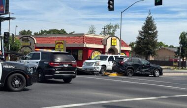 Officer responding with lights and siren in Fresno crash