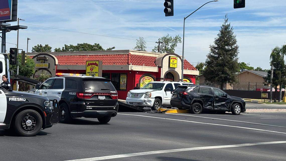 Officer responding with lights and siren in Fresno crash