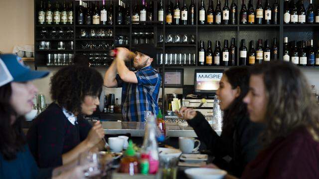 Bar manager Charles Roehr makes drinks at the full bar inside at Magpie Cafe on Sunday January 10, 2016 in Sacramento, Calif.