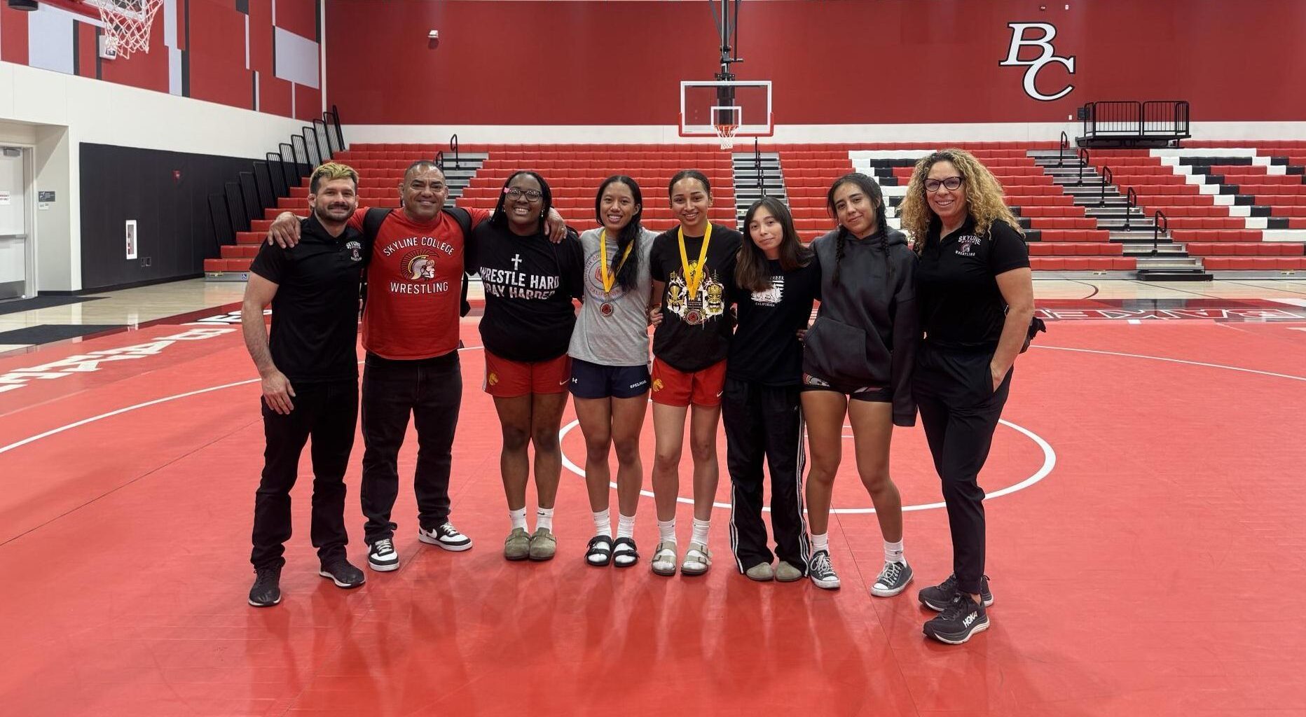 The Skyline women’s wrestling team poses in Bakersfield after competing on Saturday, March 21.