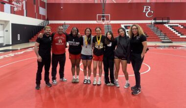The Skyline women’s wrestling team poses in Bakersfield after competing on Saturday, March 21.