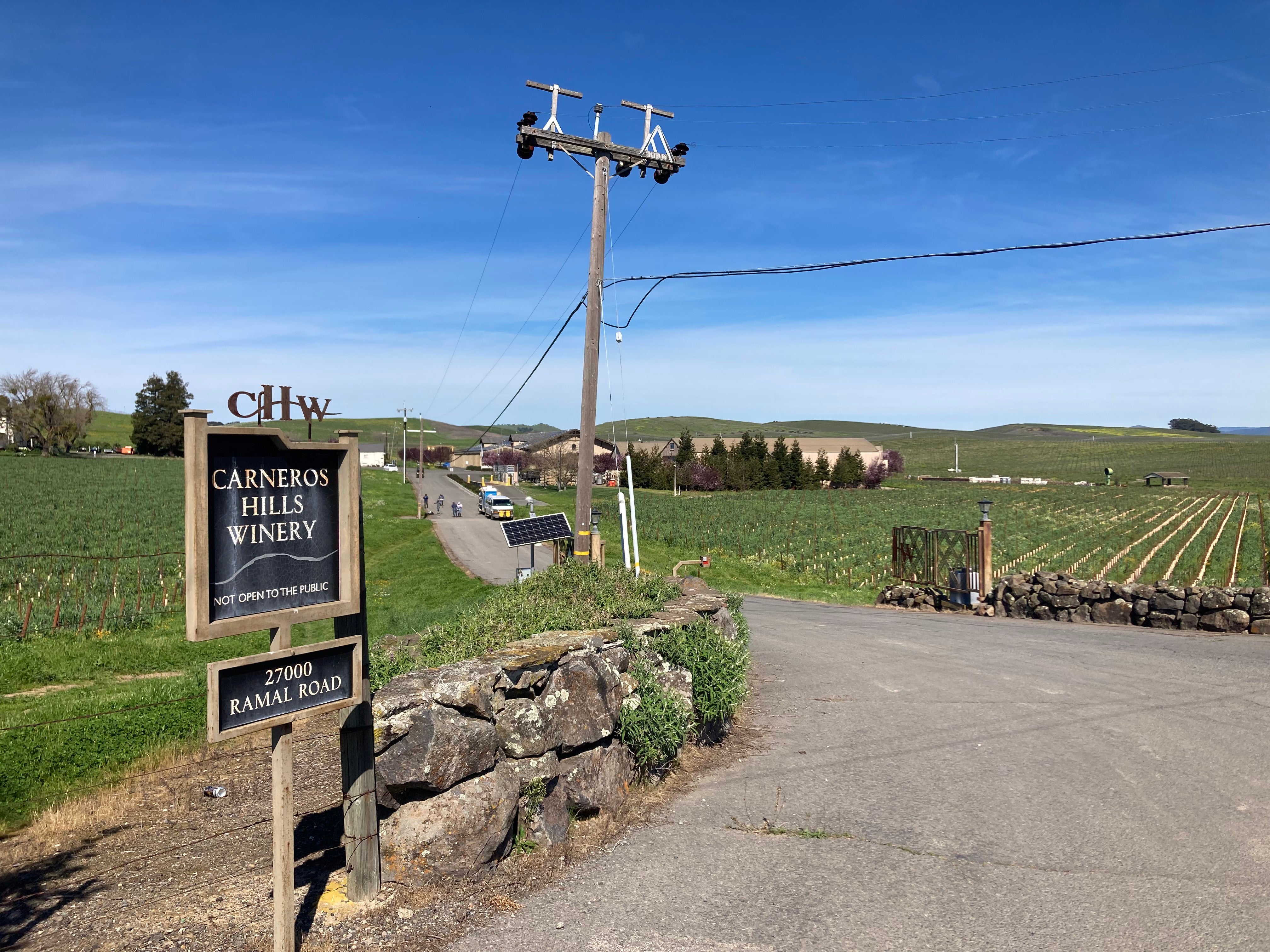 Workers and trucks were still using the roads and fields at the Carneros Hills Winery in Sonoma County, but when asked they indicated that the facility itself was closed