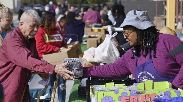 Food provided by the Central California Food Bank is distributed at Saint Rest Baptist Church Thursday, Nov. 6, 2025 in West Fresno, as federal benefits were limited due to an ongoing government shutdown. Cuts to this federal program will stress the safety net system. 