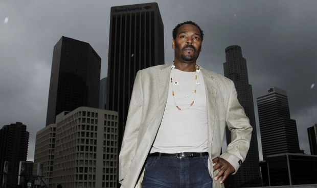 On April 13, 2012, Rodney King poses for a portrait in Los Angeles. The acquittal of four police officers in the videotaped beating of King sparked rioting that spread across the city and into neighboring suburbs. Cars were demolished and homes and businesses were burned. Before order was restored, 55 people were dead, 2,300 injured and more than 1,500 buildings were damaged or destroyed.(AP Photo/Matt Sayles) On April 13, 2012, Rodney King poses for a portrait in Los Angeles. The acquittal of four police officers in the videotaped beating of King sparked rioting that spread across the city and into neighboring suburbs. Cars were demolished and homes and businesses were burned. Before order was restored, 55 people were dead, 2,300 injured and more than 1,500 buildings were damaged or destroyed.(AP Photo/Matt Sayles)