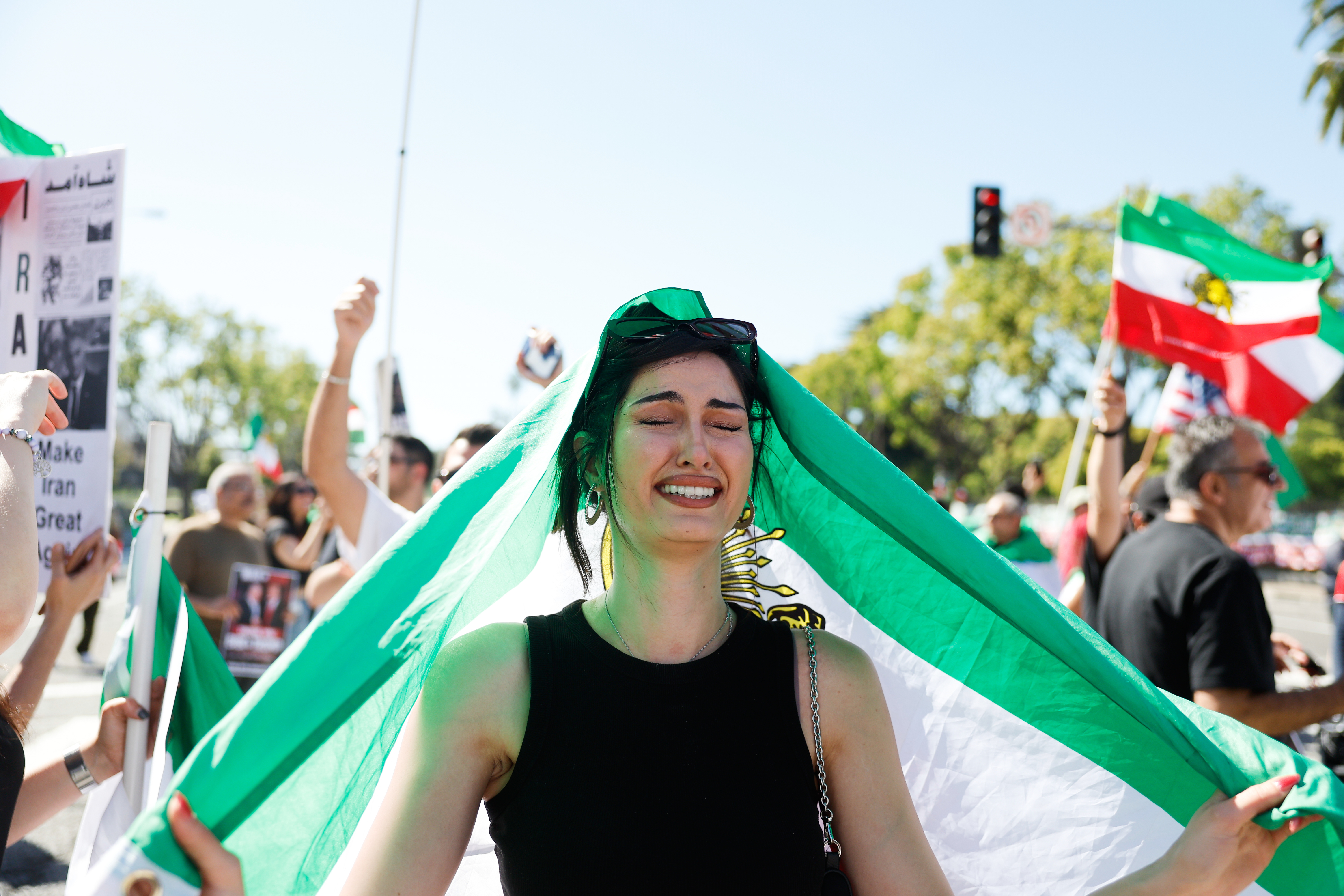 A demonstrator cries during a march in reaction to the...