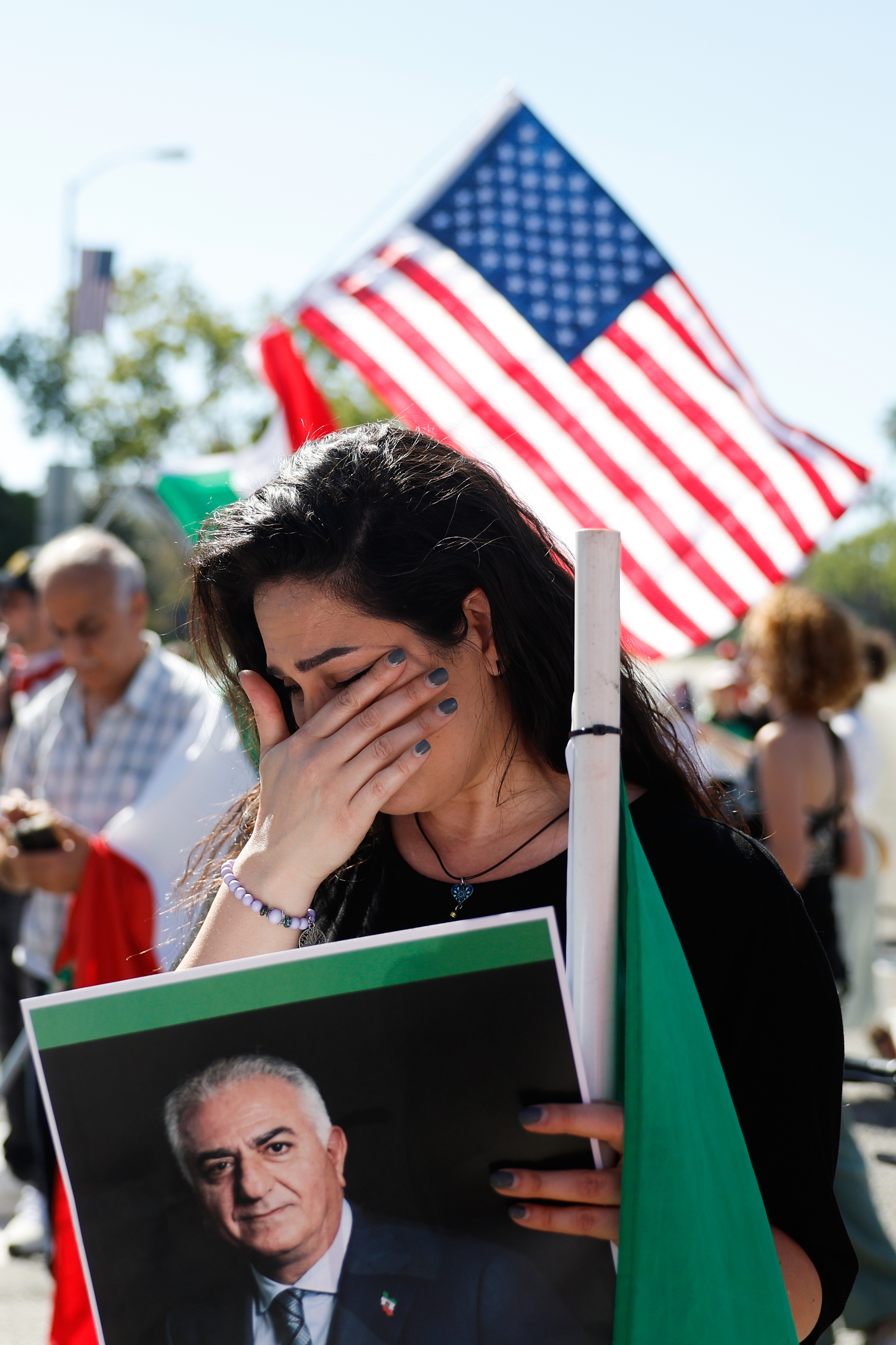 A demonstrator cries during a march in reaction to the...