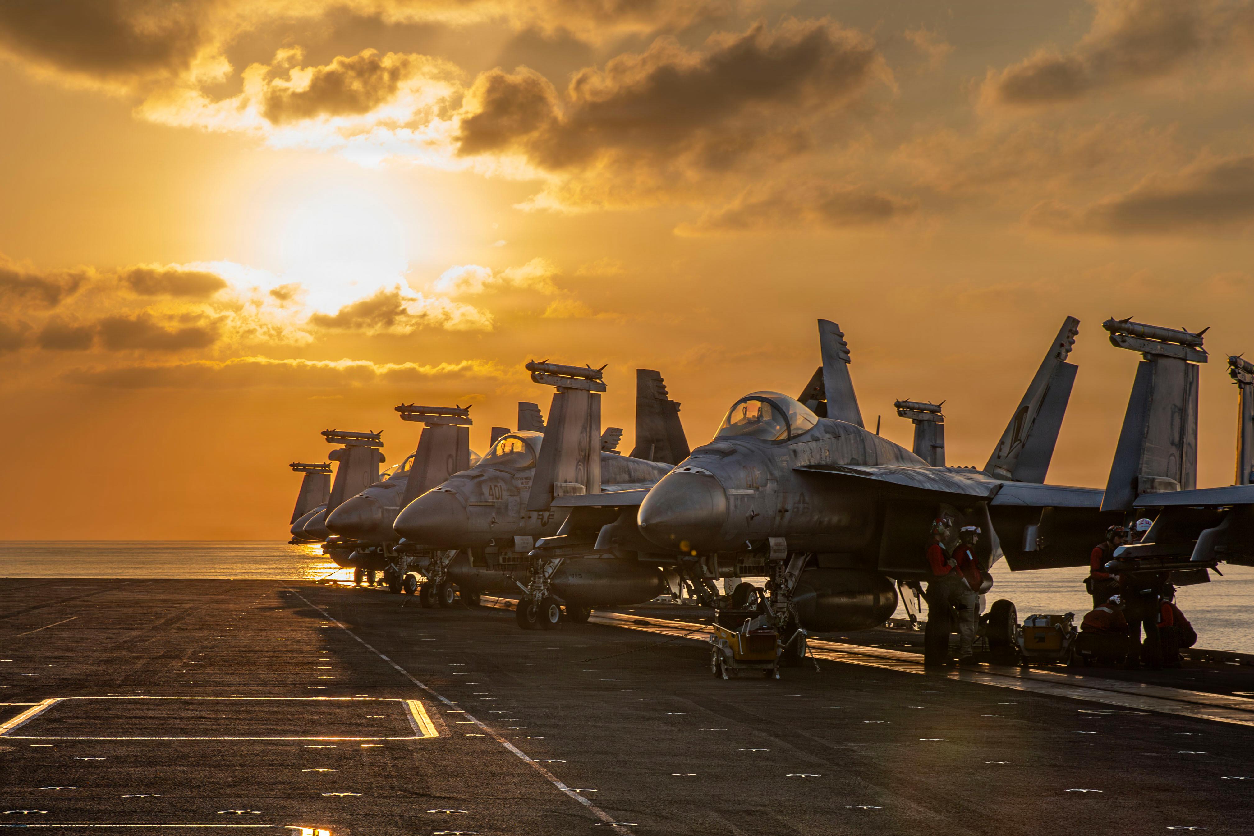 Aircraft are seen on the flight deck of the USS Abraham Lincoln.