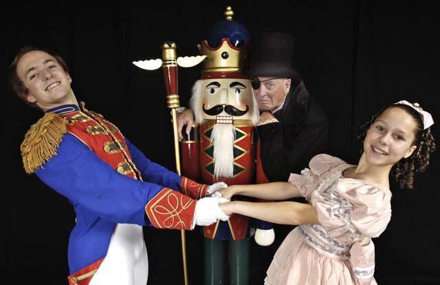 Artistic Director Ron Cunningham as Drosselmeyer with dancers Colby Damon as the prince and Samantha McKenzie, 11, as Clara for a Sacramento Ballet “Nutcracker” production in 2005.
