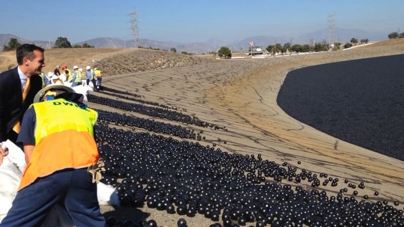 Mayor Garcetti celebrates the deployment of shade balls at the LA Reservoir in 2015. 