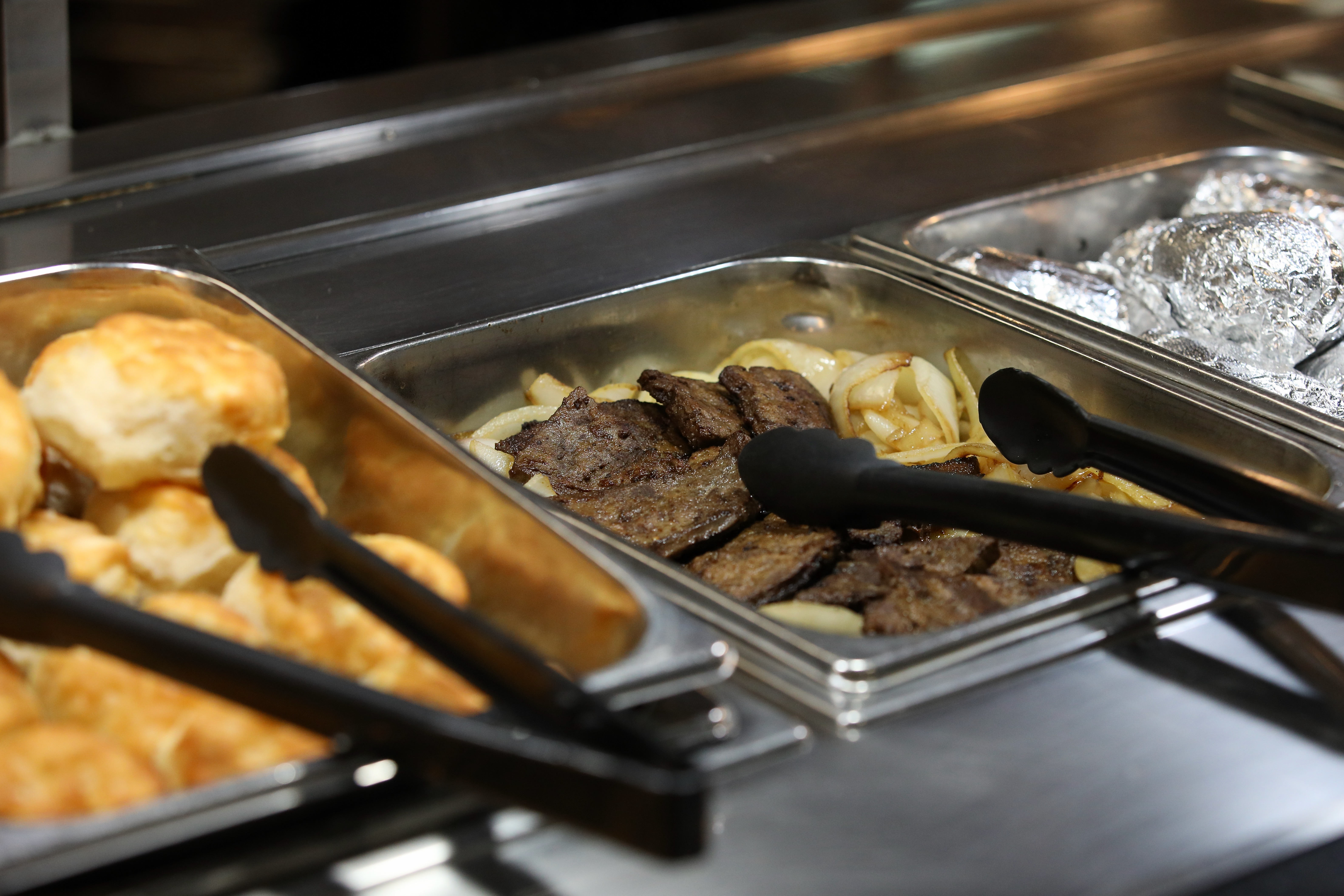 The buffet is stocked during lunchtime at Golden Corralâs City...