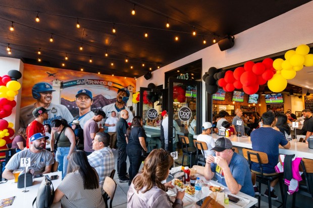 The Dog Haus burger and hot dog chain is continuing its expansion with a new location in San Fernando that's also offering a look at the chain's new menu. (Photo by Eddie Rangel)