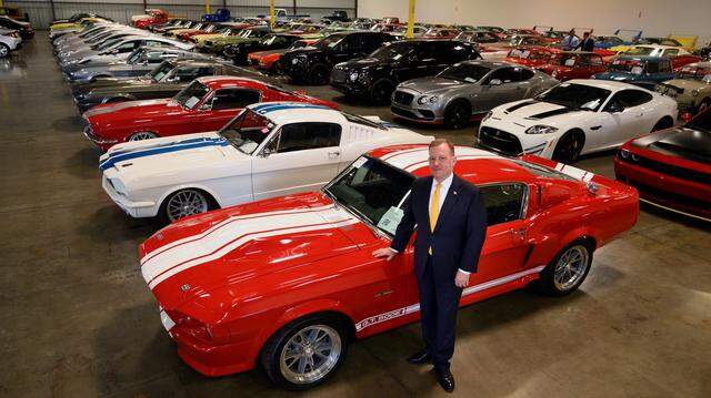 McGregor Scott, U.S. attorney, stands next to a 1967 Ford Shelby GT 500 at a warehouse in Woodland on Sept. 16, 2019. The car was one of 150 owned by Jeff Carpoff, who pleaded guilty in a massive Ponzi scheme in connection with the company DC Solar. The company’s attorney, Ari Lauer, was sentenced to 11 years and  five months in federal prison on Monday.