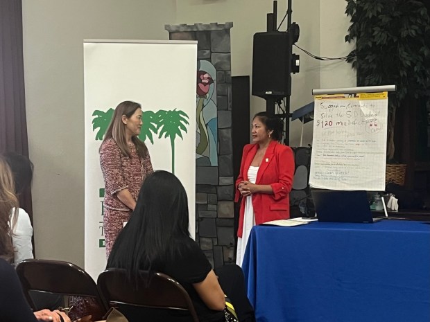 Natasha Wong (left) is given the La Jolla Town Council's 2026 Women Who Inspire award by council President Mary Soriano. (Noah Lyons)