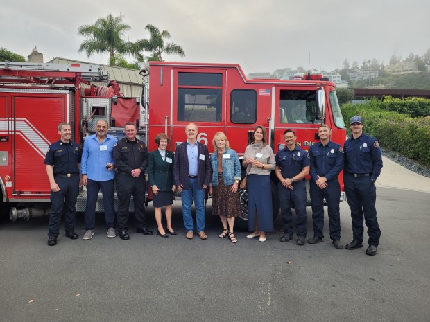 Visitors and firefighters gather at a Nov. 12 open house at La Jolla's Fire Station 16 that raised $20,000 toward the station's renovation. (Provided by Wendy Moore)