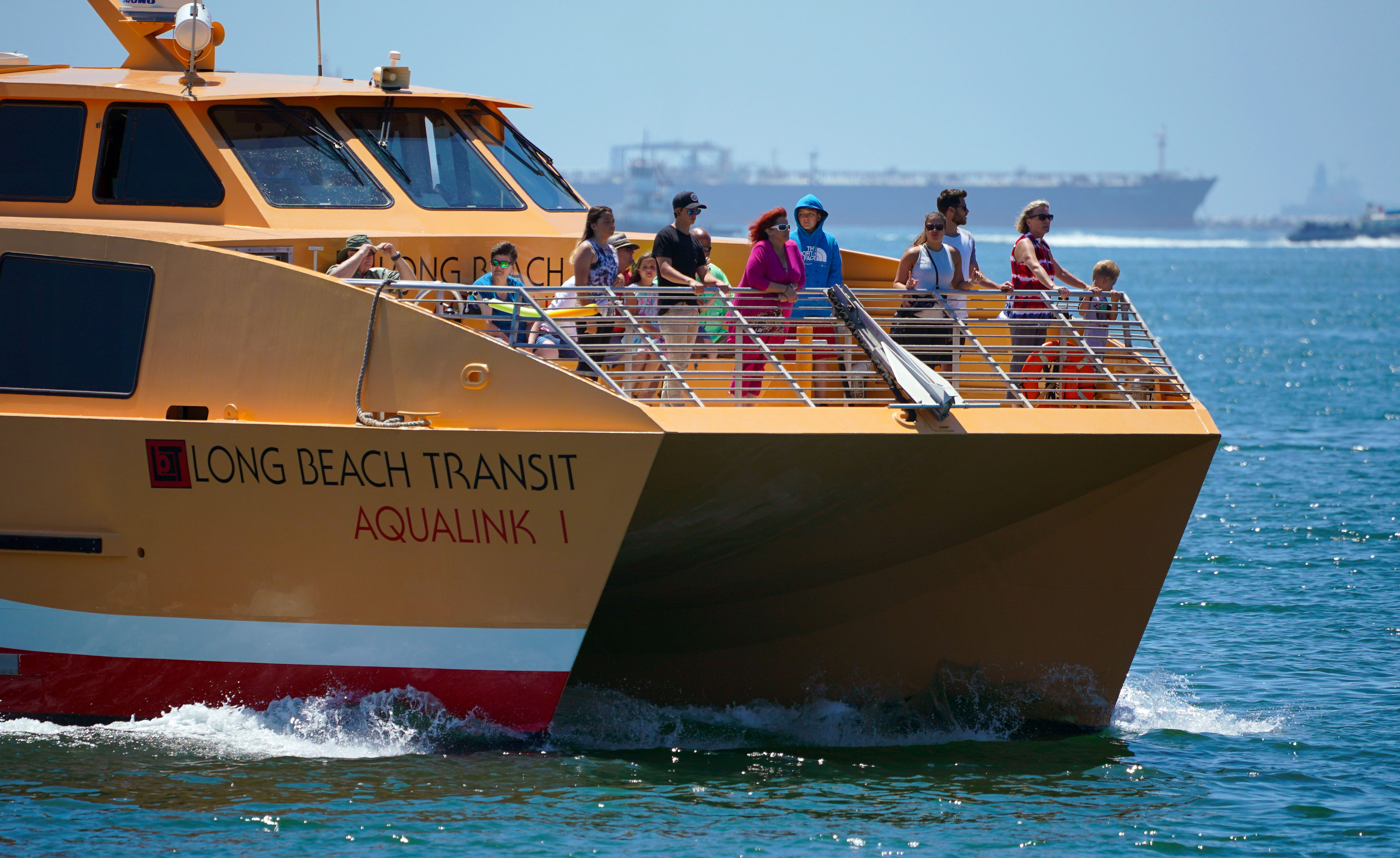 A Long Beach Transit Aqualink boat ferries passengers from Alamitos...