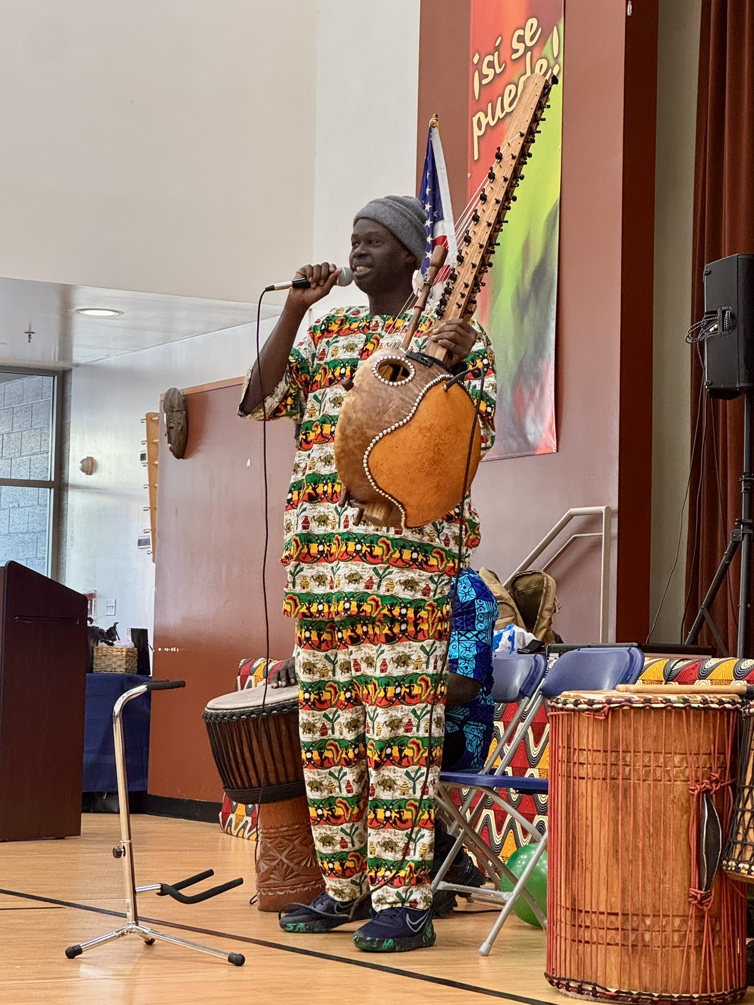 Amadou Falls demonstrates the West African kora, a 21-string harp/lute...