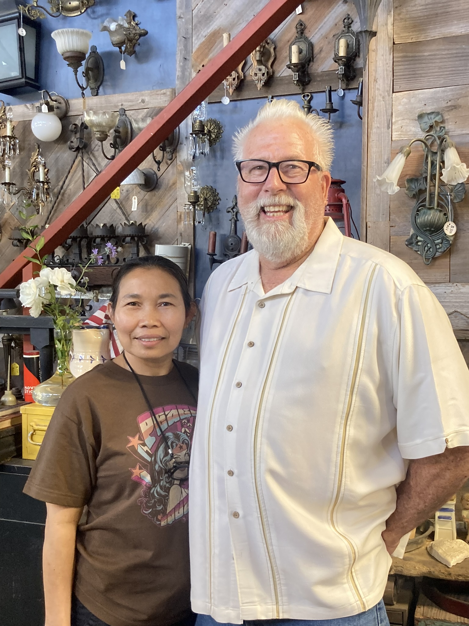 Tom Barnes (R), and his wife Sinoeun “Noon” (L), are...