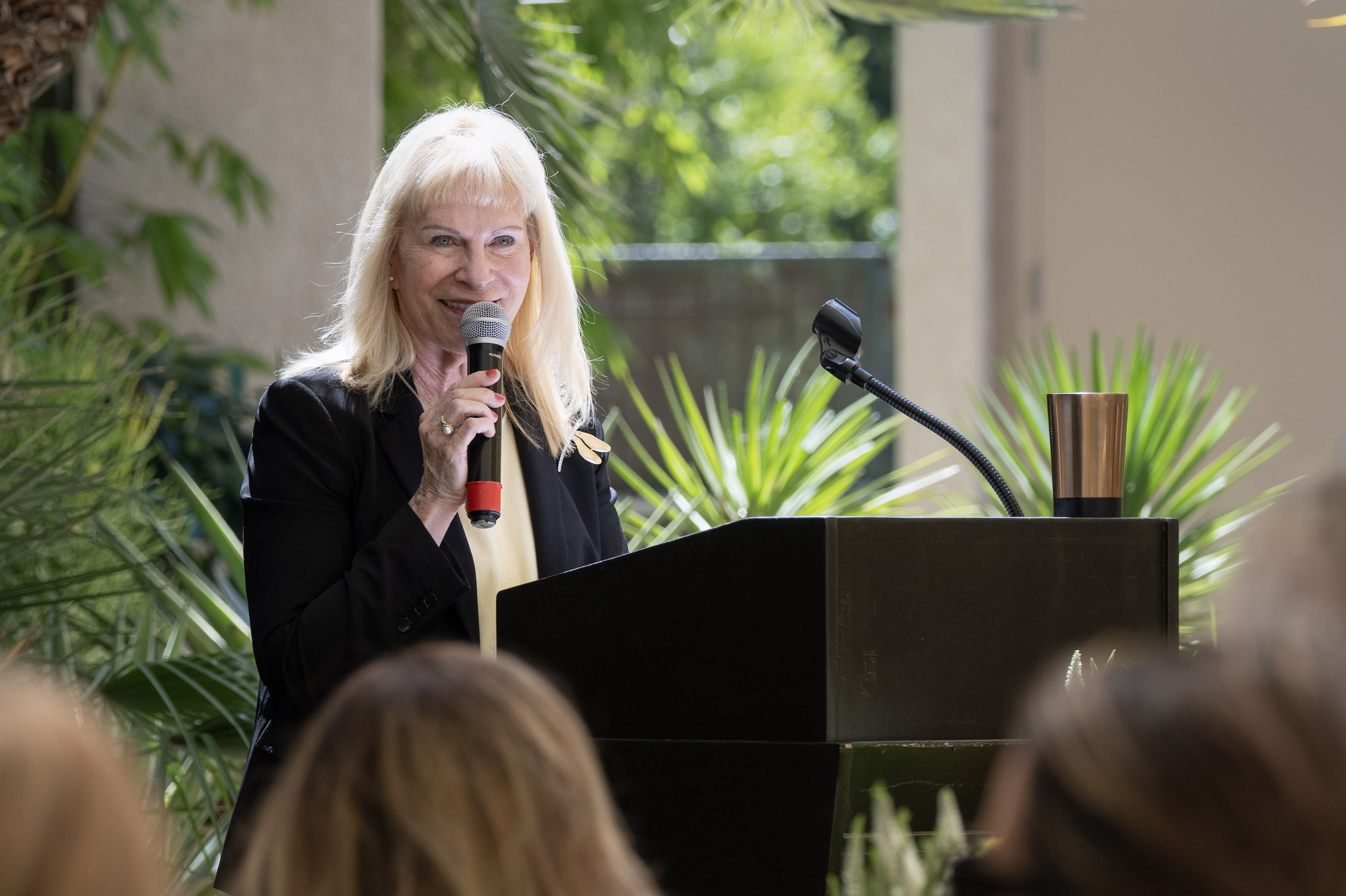 Gina Rushing Maguire speaks after being recognized by the Rick...