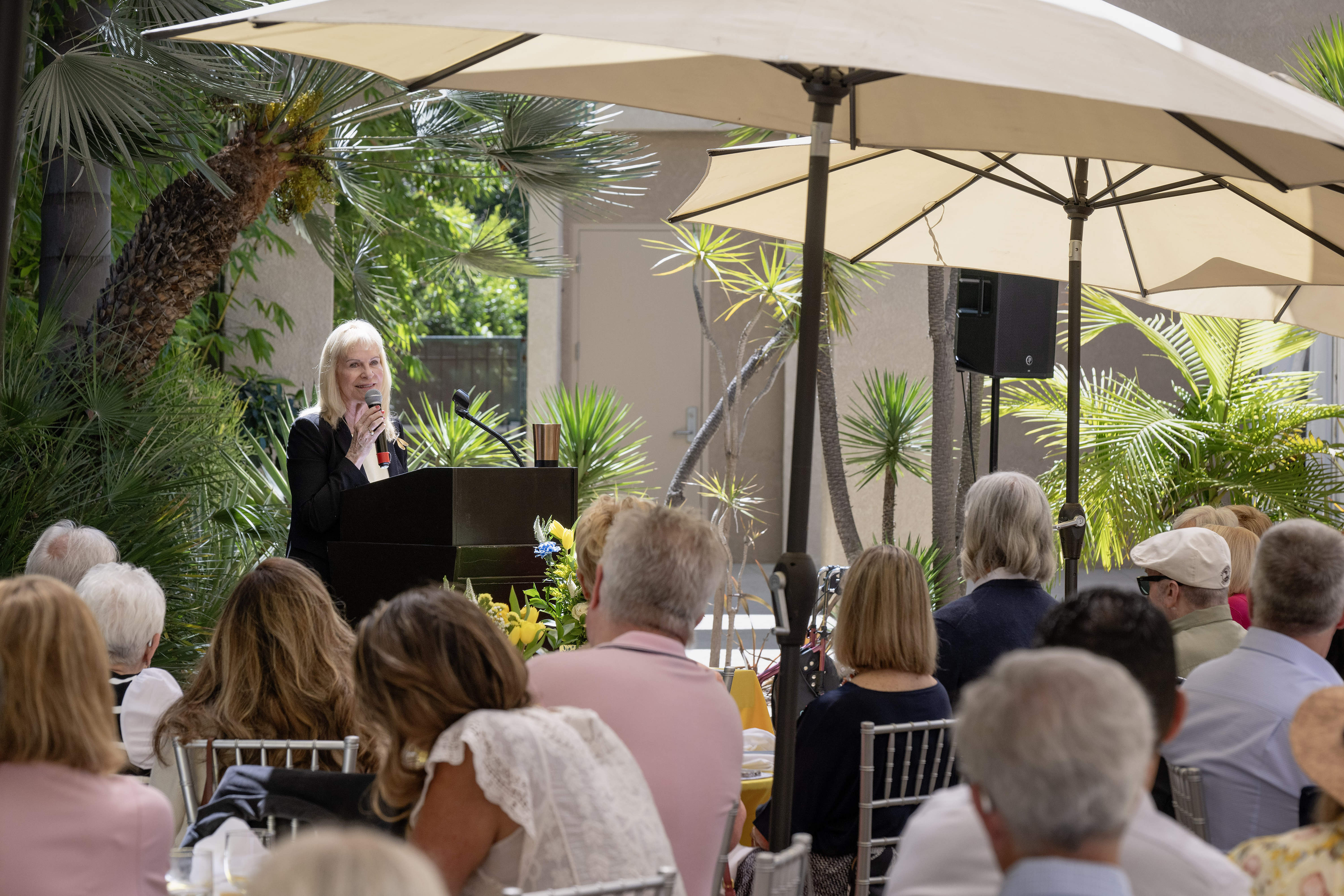 Gina Rushing Maguire speaks after being recognized by the Rick...