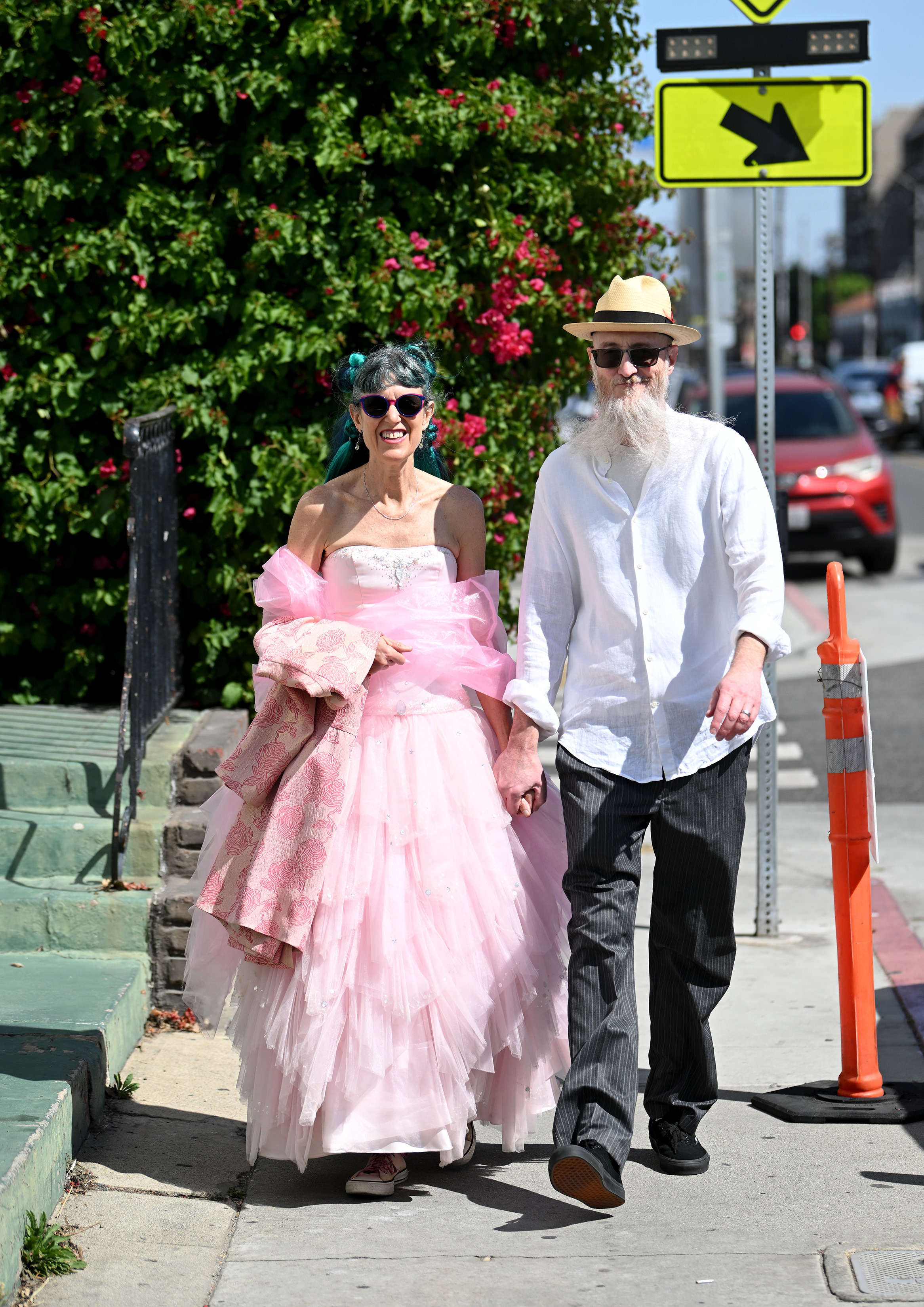 John and Kristen Corenbaum arrive for the Long Beach Art...